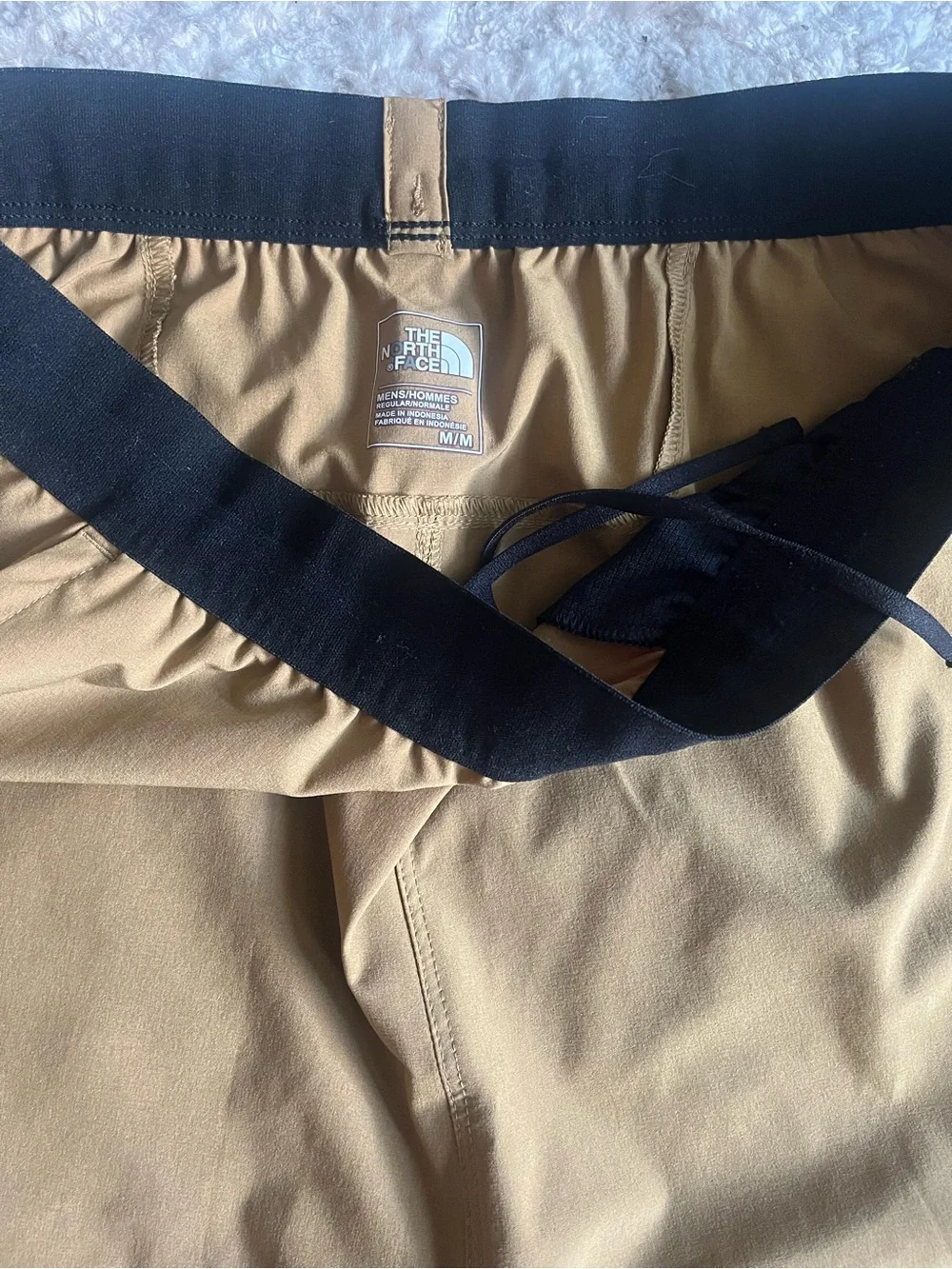 The North Face Men’s ESSENTIAL Track/Running pants in Tan with Black Accents